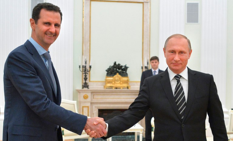 Russian President Vladimir Putin spoke with key players in the Syria conflict, including President Bashar Assad, ahead of a U.S.-Russia-engineered cease-fire. (Alexei Druzhinin/Sputnik, Kremlin Pool Photo via AP, File)
