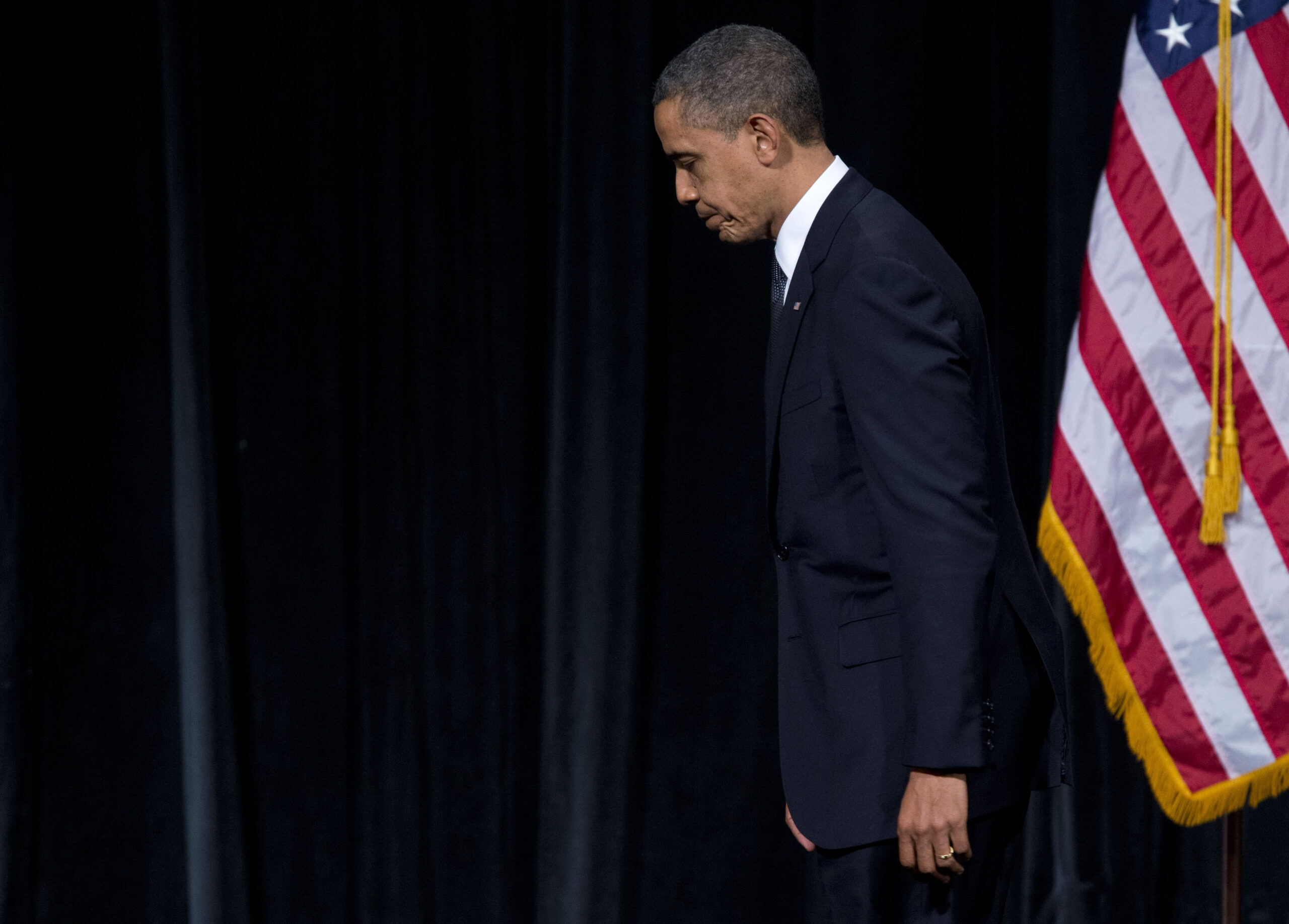 Obama grieves, promises to use power to help