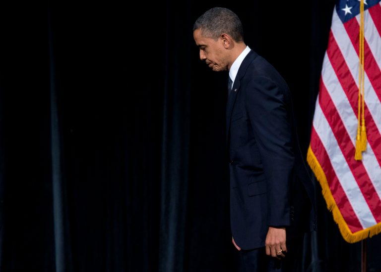   President Barack Obama walks off after delivering a speech at an interfaith vigil for the victims of the Sandy Hook Elementary School shooting on Sunday, Dec. 16, 2012 at Newtown High School in Newtown, Conn. A gunman walked into Sandy Hook Elementary School Friday and opened fire, killing 26 people, including 20 children. (AP Photo/Evan Vucci)  