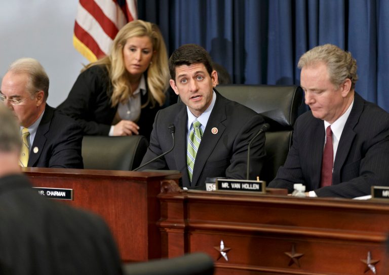 House Budget Committee Chairman Rep. Paul Ryan, R-Wis., center, presides over a markup session where House Republicans are crafting a budget-balancing plan that sharply cuts spending on transportation, health care programs for the middle class and the poor, food stamps and other domestic initiatives, Wednesday, April 2, 2014, on Capitol Hill in Washington. Ryan is flanked by Rep. Chris Van Hollen, D-Md., right, the committee's ranking member, and Rep. Tom Price, R-Ga., left.  (AP Photo/J. Scott Applewhite)