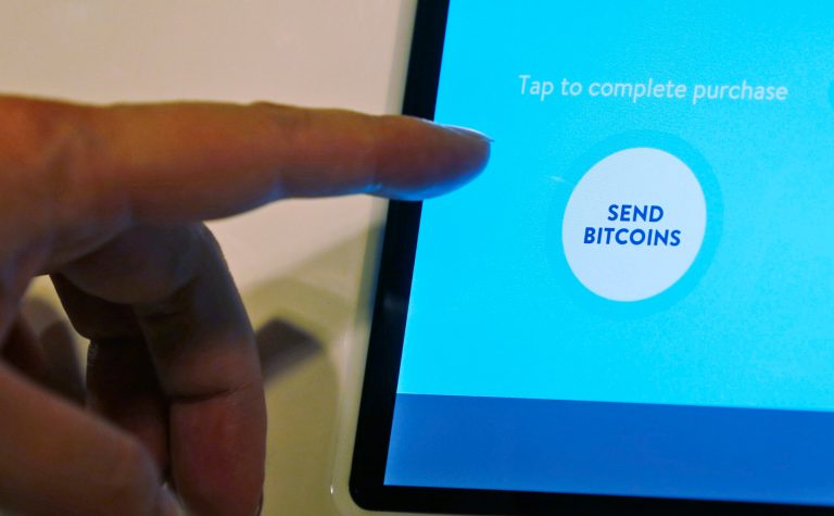 Additionally, it said the IRS needs to help taxpayers calculate and pay their tax obligations for bitcoin. (AP Photo/Kin Cheung)