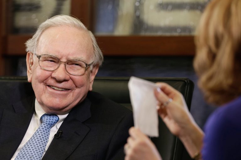 FILE - In this May 5, 2014 file photo, billionaire Berkshire Hathaway Chairman and CEO Warren Buffett smiles during an interview with Liz Claman on the Fox Business Network in Omaha, Neb. Berkshire Hathaway, owner of businesses ranging from the BNSF railroad to Dairy Queen, Geico insurance and power providers, on Thursday, Oct. 2, 2014 announced it is buying the privately-owned auto dealership company Van Tuyl Group. (AP Photo/Nati Harnik, File)