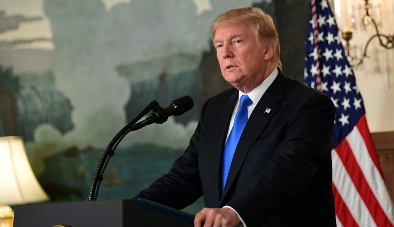 President Donald Trump speaks from the Diplomatic Reception Room at the White House in Washington, Friday, Oct. 13, 2017. (AP Photo/Susan Walsh)