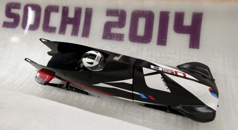 Elena Meyers and Katie Eberling of the United States take a turn during a training session for the women's bobsleigh at the 2014 Winter Olympics,  Friday, Feb. 14, 2014, in Krasnaya Polyana, Russia. (AP Photo/Michael Sohn)