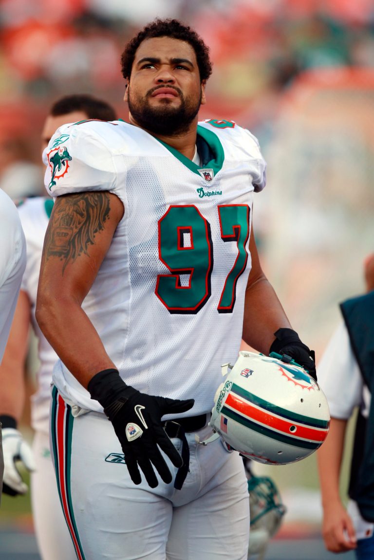 Miami Dolphins defensive tackle Phillip Merling (97) is seen on the sidelines during the first half of an NFL football game against the Houston Texans, Sunday, Sept. 18, 2011, in Miami. (AP Photo/Wilfredo Lee)