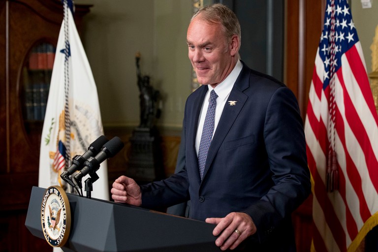Interior Secretary Ryan Zinke said that President Trump's long-promised southwest border wall shouldn't be built on the American side of the line. (AP Photo/Andrew Harnik)