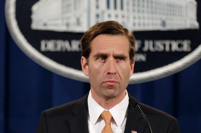 In this Feb. 5, 2013 file photo, Delaware Attorney General Beau Biden pauses while speaking at a news conference at the Justice Department in Washington. On Saturday, May 30, 2015, Vice President Joe Biden announced the death of his son, Beau, from brain cancer. (AP Photo/Jacquelyn Martin)