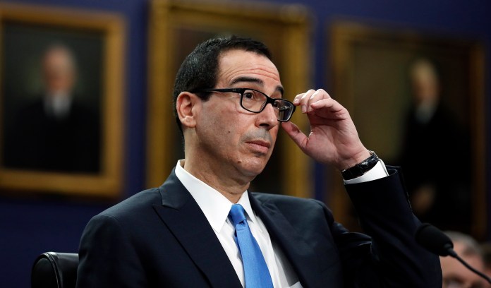 Treasury Secretary Steven Mnuchin watched Monday's total solar eclipse from the top of Fort Knox. (AP Photo/Alex Brandon)