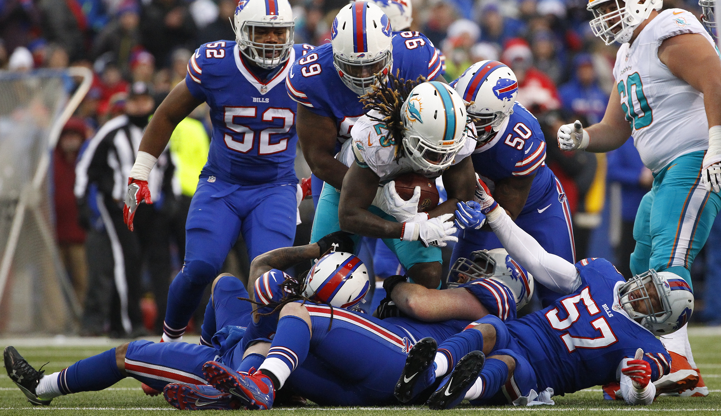 Don’t punt on football’s concussion issues, but don’t quit the game either