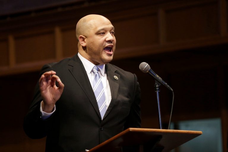 U.S. Rep. Andre Carson, D-Ind., speaks during a church service at Wellspring Church Sunday, Jan. 18, 2015, in Ferguson, Mo. (AP Photo/Jeff Roberson)
