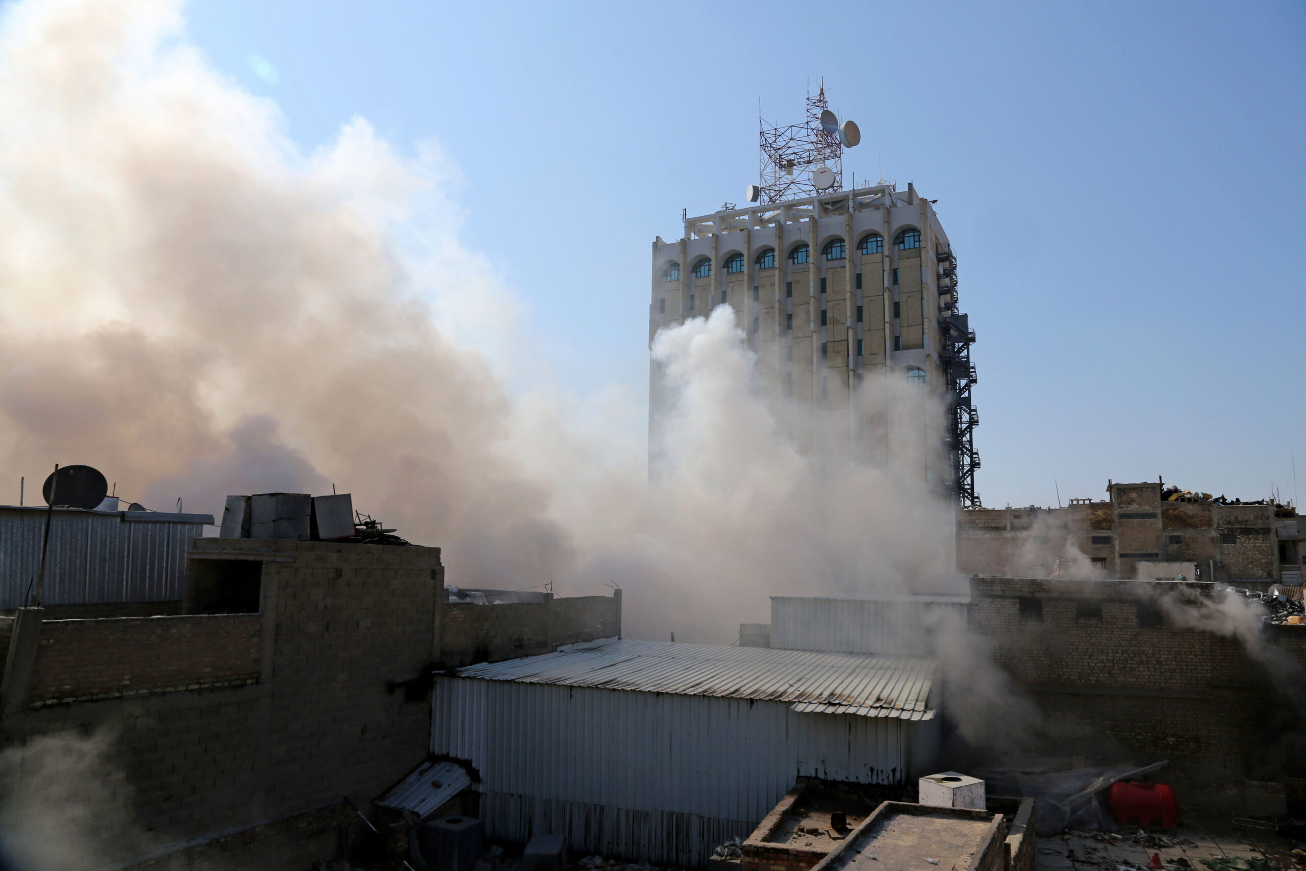 Explosions rock Iraqi capital, killing at least 34