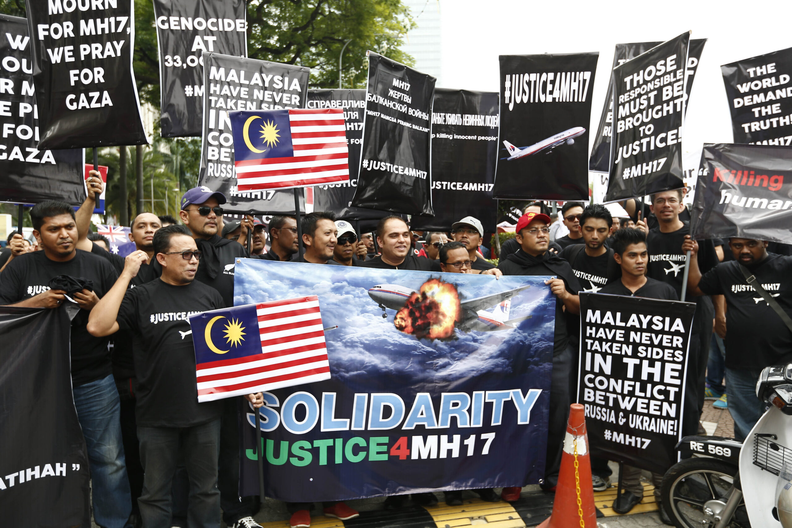 Protesters in Malaysia seek justice from Russia