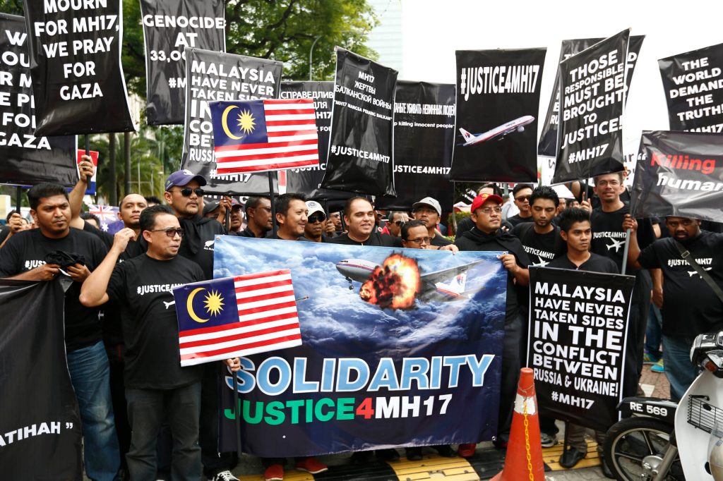 Protesters in Malaysia seek justice from Russia