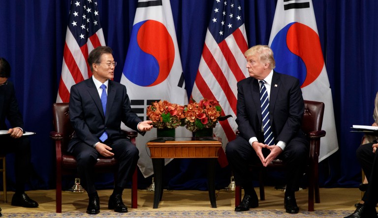 President Trump (pictured right) talked to South Korean President Moon Jae-in (pictured left), as well as Japanese Prime Minister Shinzo Abe, ahead of the Winter Olympics next week in Pyeongchang, South Korea. (AP Photo/Evan Vucci)