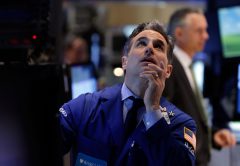 Stocks fall on jitters over earnings, tech rout