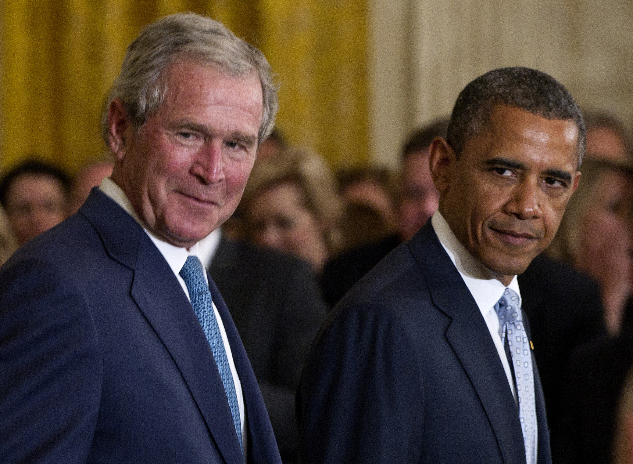 Obama fights George W. Bush for spotlight on Africa trip