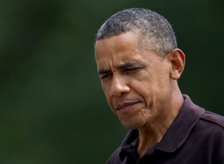 President Barack Obama arrives the White House in Washington, Sunday, Aug. 5, 2012.  President Obama said Sunday that he and first lady Michelle Obama are 