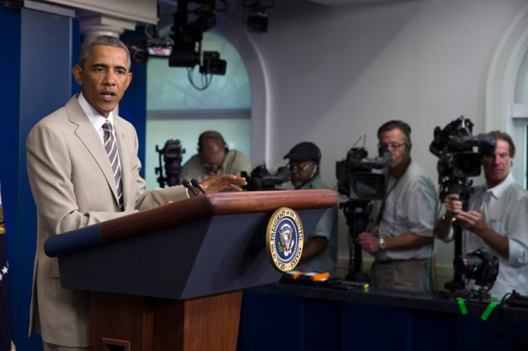 President Barack Obama gestures in the James Brady Press Briefing Room of the White House in Washington, Thursday, Aug. 28, 2014, where he spoke about the economy, Iraq, and Ukraine, before convening a meeting with his national security team on the militant threat in Syria and Iraq. (AP Photo/Evan Vucci)