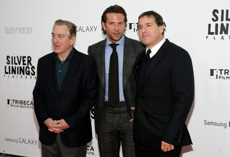 Actors Robert DeNiro, left, Bradley Cooper, and Director David O. Russell, right, attend the premiere of 