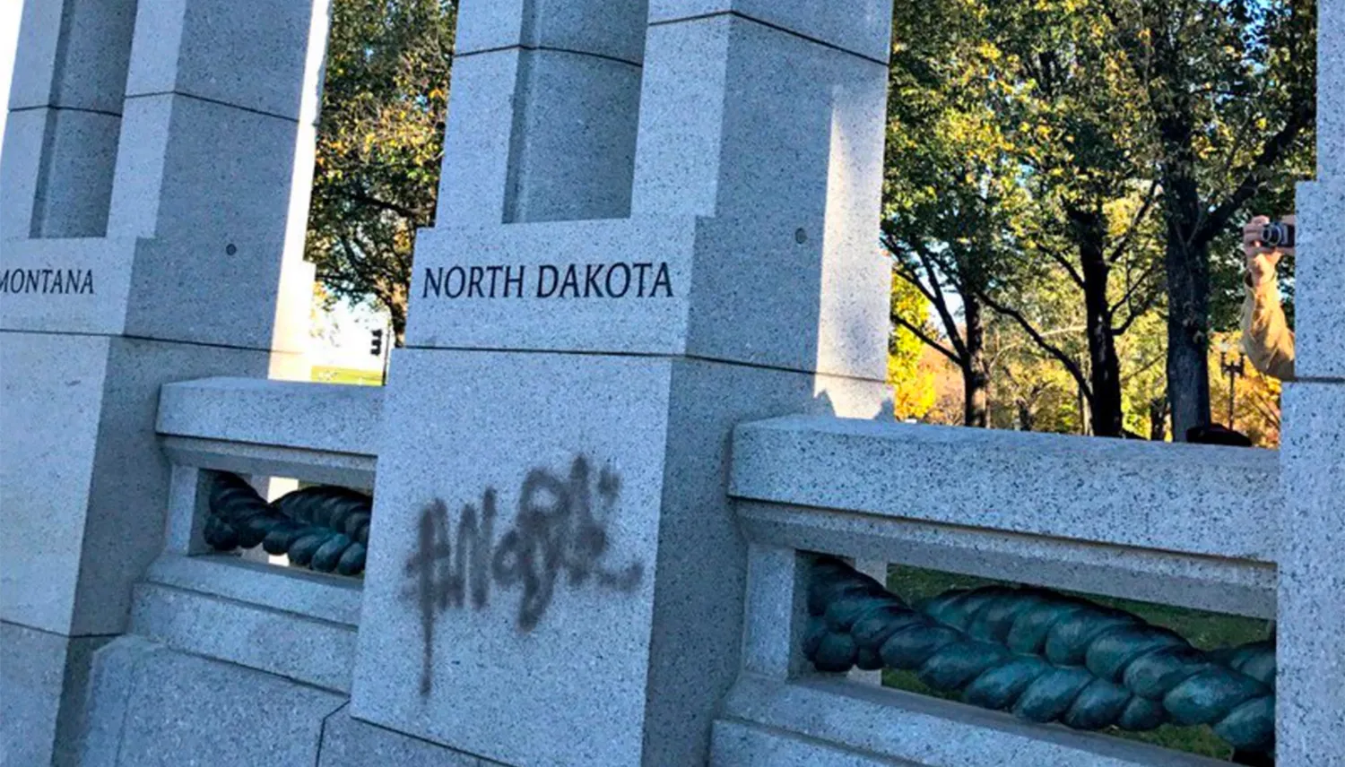 Anti-pipeline slogan spraypainted on WWII Memorial