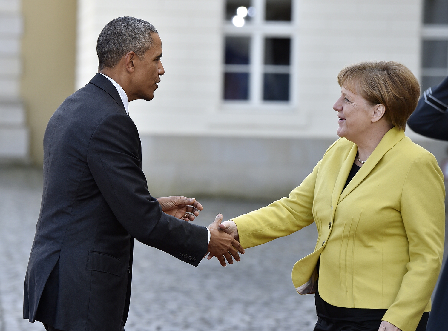 Obama meets Merkel to boost U.S.-European trade
