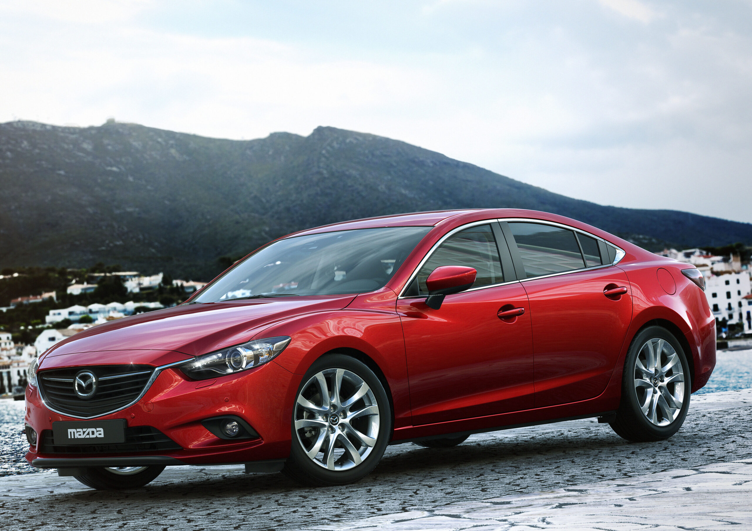 EPA says new vehicle mileage hits record 24.1 mpg