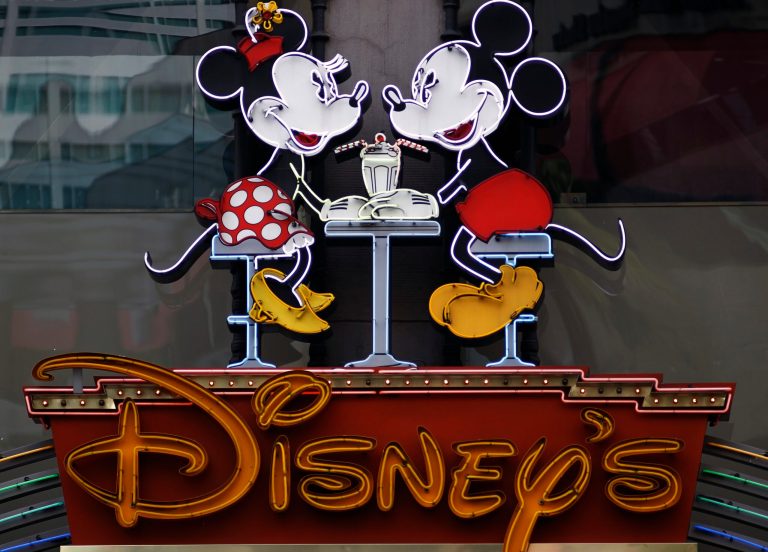   FILE-In this photo Feb. 6, 2012, file photo, the Disney Soda Fountain & Studio Store marquee is seen on Hollywood Boulevard in Los Angeles. The Walt Disney Co. said Tuesday, June 5, 2012, its programming will no longer be sponsored by junk food, becoming the first major media company to ban such ads for its TV channels, radio stations and websites intended for children. (AP Photo/Damian Dovarganes)  