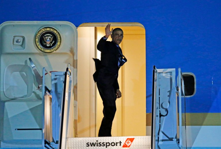 President Barack Obama waves from the top of the steps of Air Force One before departing from JFK International airport, Wednesday, June 8, 2016, in New York for a Democratic fundraiser. He signed a DNC fundraising letter on his last full day in office. (AP Photo/Kathy Willens)