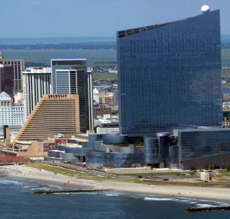 This July 11, 2014 photo shows the Showboat Casino Hotel, left, and revel Casino Hotel, right, in Atlantic City N.J. On Monday Aug. 11, 2014, the New Jersey Casino Control Commission said it lacks the power to force the Showboat's owners to keep it open for four additional months past its Aug. 31 shutdown date while a buyer is sought. Meanwhile, Revel was weighing bids in advance of a bankruptcy auction, and has warned it too may shut down if a buyer can't be found.(AP Photo/Wayne Parry)