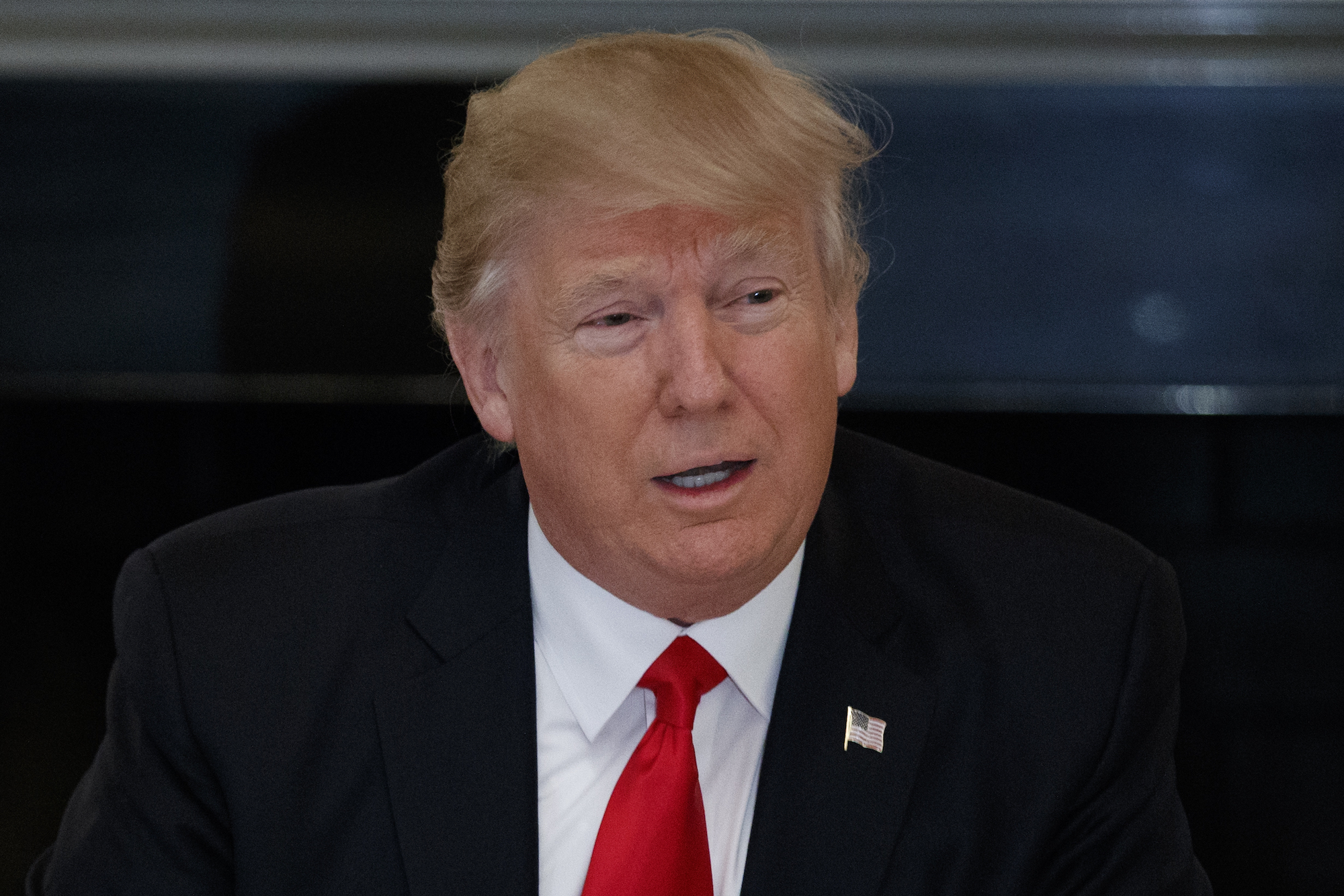 Trump administration extends Iran nuke sanctions relief, adds other sanctions