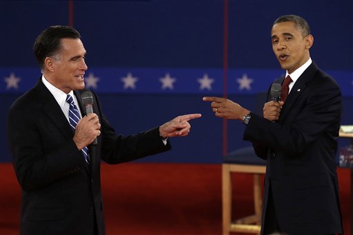 In this Oct. 16, 2012 file photo, Republican presidential nominee Mitt Romney, left, and President Barack Obama spar during the second presidential debate at Hofstra University in Hempstead, N.Y. (AP Photo/Charlie Neibergall, File)
