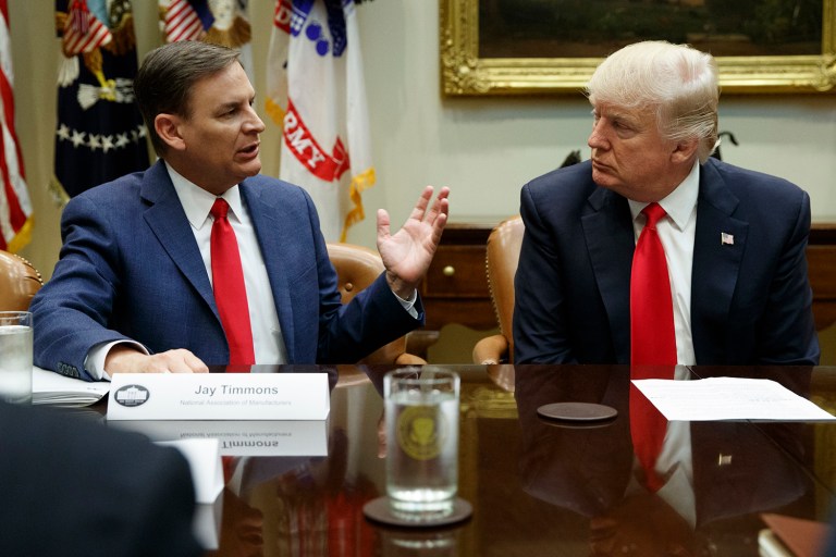 President Donald Trump listens as Jay Timmons, president of the National Association of Manufacturers speaks during a meeting in the Roosevelt Room of the White House in Washington, Friday, March 31, 2017. (AP Photo/Evan Vucci)