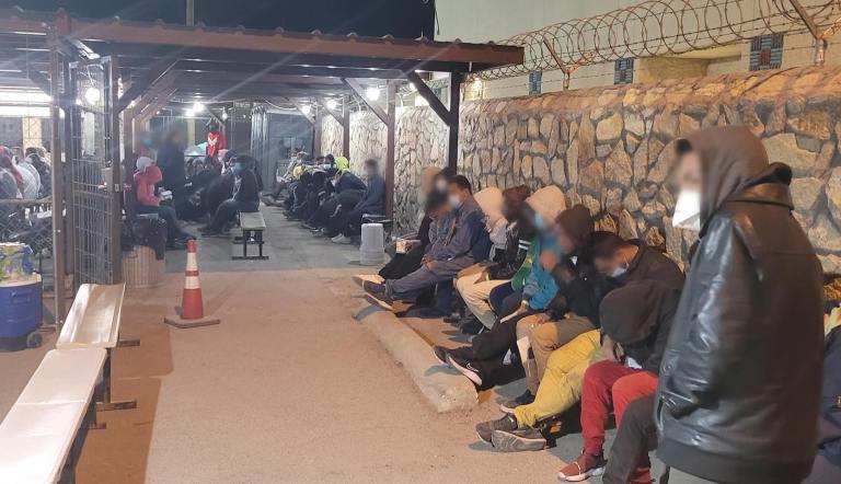Immigrants who illegally crossed the U.S.-Mexico border into El Paso over the weekend are held outside federal facilities due to a shortage of space.