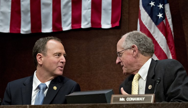 Rep. Adam Schiff, D-Calif., and ranking member of the House Intelligence Committee, left, speaks with Rep. Mike Conaway, R-Texas, before the start of a House Intelligence Committee hearing on the Russian interference in U.S. politics.