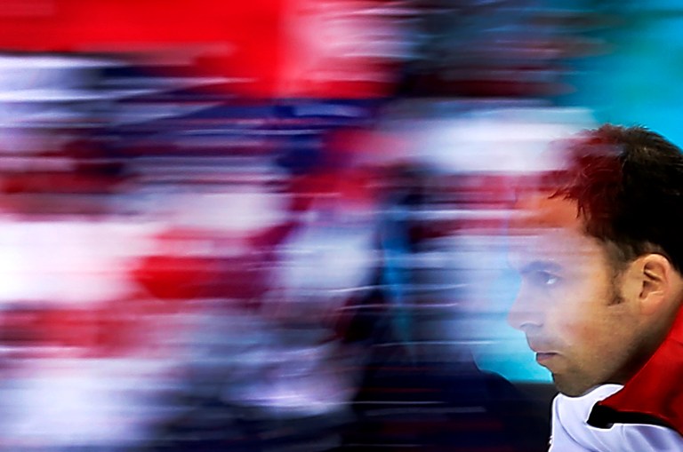 Britain's skip David Murdoch delivers the stone during the men's tiebreaker curling match against Norway at the 2014 Winter Olympics, Tuesday, Feb. 18, 2014, in Sochi, Russia. (AP Photo/Wong Maye-E)