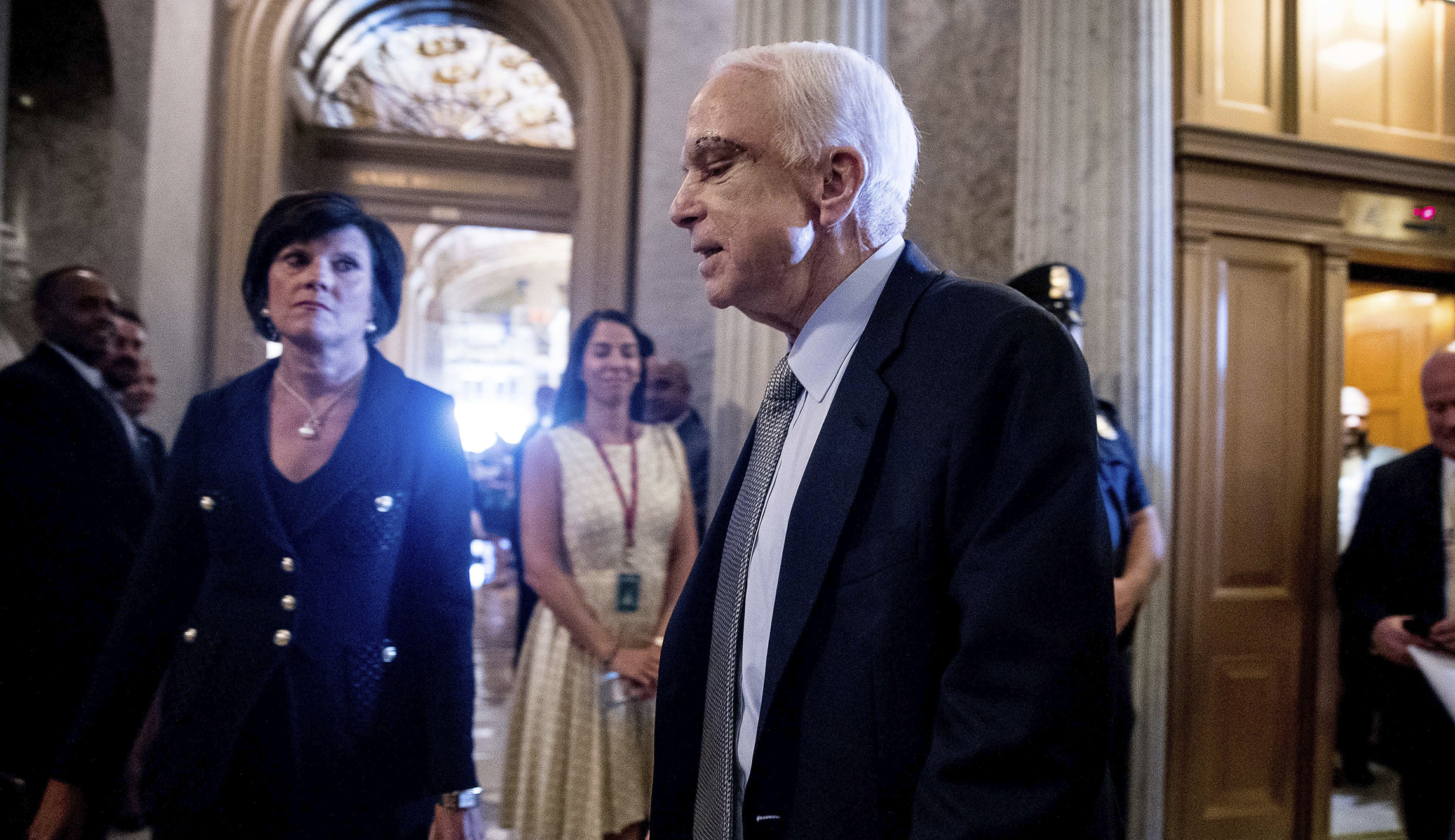 When shrieking liberal protesters went low, John McCain went high