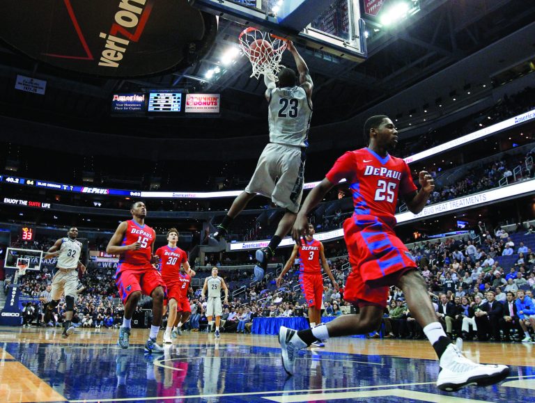 Alex Brandon/AP
Georgetown forward Aaron Bowen dunks behind his back during the Hoyas' 90-66 win over DePaul at Verizon Center on Wednesday.