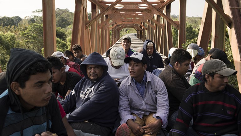 A group of Central American refugees and asylum seekers, led by the non-profit humanitarian organization Pueblos Sin Fronteras (People Without Borders), ride 'The Beast' freight train in Matias Romero, Oaxaca state, Mexico.