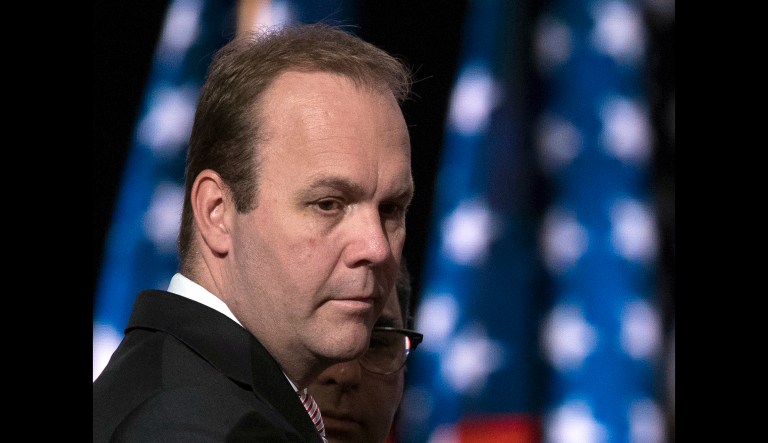 Rick Gates, campaign aide to Republican presidential candidate Donald Trump, was told to surrender to federal authorities Monday. (AP Photo/Evan Vucci, File)