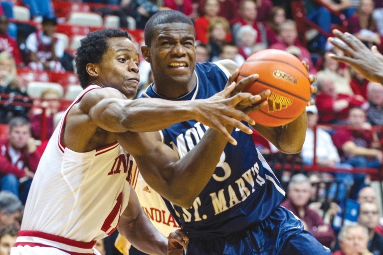 Doug McSchooler/AP
Sam Prescott, right, and the Mountaineers will play for an NCAA berth Tuesday.
