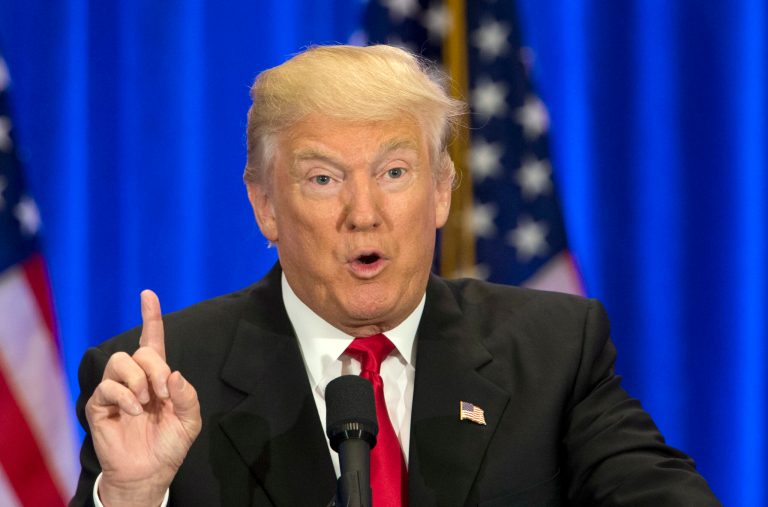 Stephen Moore said on a panel hosted by Politico that the new version of Donald Trump's tax plan will add one-third as much to the deficit as originally projected. (AP Photo)