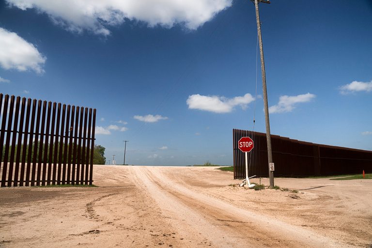 The fence marking the border between Mexico and the United States is photographed on Wednesday in La Paloma, Texas. (AP/Valley Morning Star, David Pike)