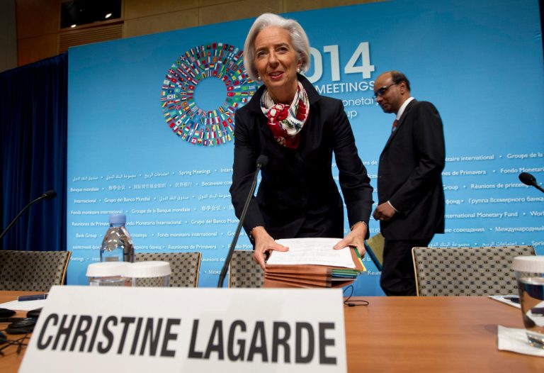 International Monetary Fund (IMF) Managing Director Christine Lagarde accompanied by IMFC Chair and Singapore Finance Minister Tharman Shanmugaratnam, arrive for a news conference during the World Bank Group-International Monetary Fund Spring Meetings in Washington, Saturday, April 12, 2014. ( AP Photo/Jose Luis Magana)