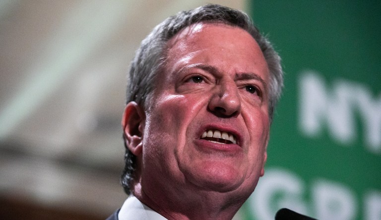 Bill de Blasio, mayor of New York City, speaks during a Green New Deal rally in the lobby of Trump Tower in New York, on Monday, May 13, 2019.