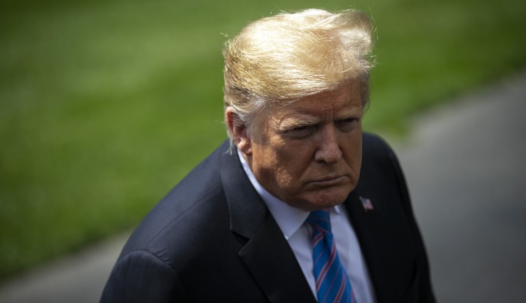 President Trump listens to a question from a member of the media before boarding Marine One on the South Lawn of the White House in Washington, D.C., on Tuesday, May 14, 2019.