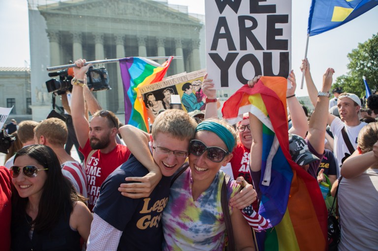 Gay marriage supporters celebrate outside the Supreme Court on Wednesday. (Examiner/Graeme Jennings)