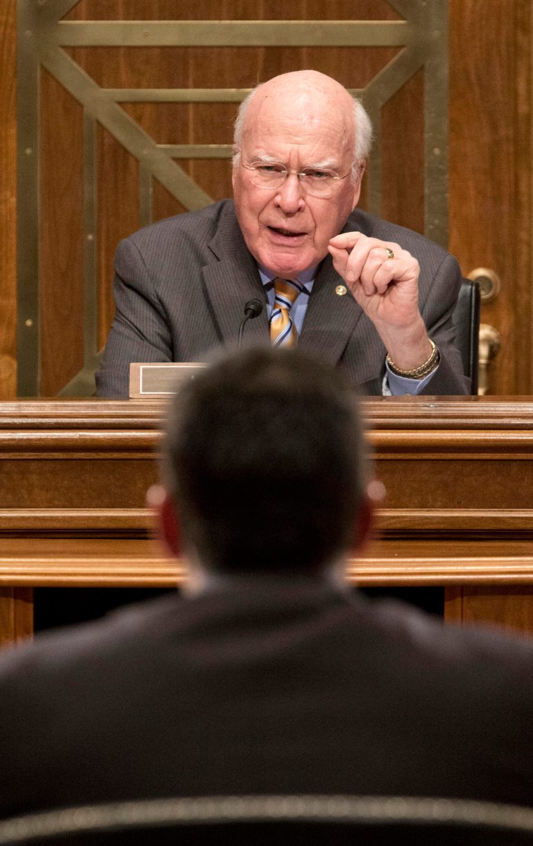 Senate subcommittee on State, Foreign Operations and Related Programs  Chairman Sen. Patrick Leahy, D-VT., top, questions US Agency for International Development (USAID) Administrator Dr. Rajiv Shah, bottom, on Capitol Hill in Washington, Tuesday, April 8, 2014, during the committee's hearing of the USAID's fiscal 2015 budget. Leahy demanded to know who came up with the idea to launch a secret "Cuba Twitter" social network system. Speaking at the subcommittee hearing, Leahy called the project "cockamamie." (AP Photo/Pablo Martinez Monsivais)
