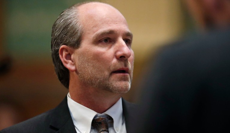 In this photo from Friday, Colorado state Rep. Steve Lebsock listens during a debate about whether to expel the lawmaker over sexual misconduct allegations from his peers. Lebsock changed his party affiliation at the last minute from Democratic to Republican, meaning that his replacement will be a Republican as well. (AP Photo/David Zalubowski)
