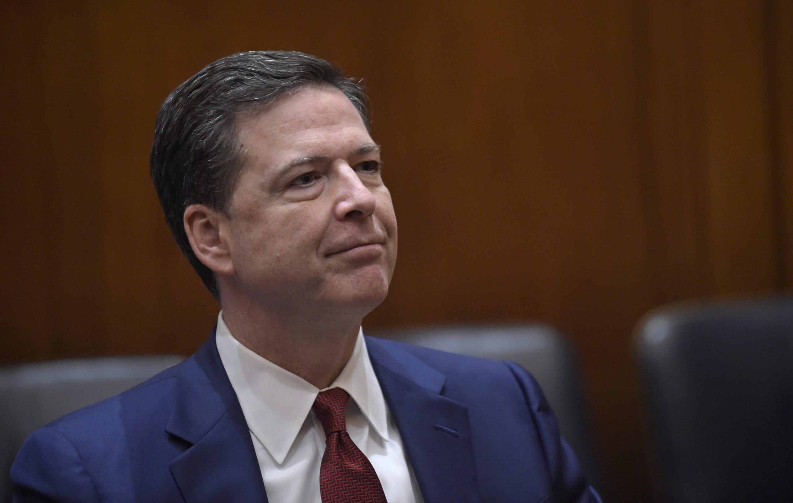 FBI Director James Comey huddles with lawmakers about wiretapping allegations, WikiLeaks