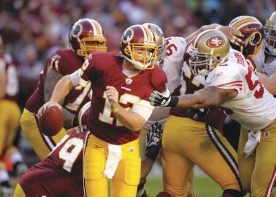Cliff Owen/AP
John Beck made quicker decisions,but not always the right ones,against the 49ers.